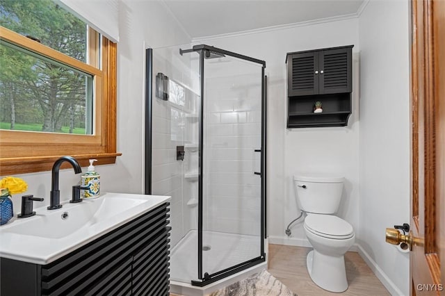2380 E Lake Rd, Spafford, NY 13152 - bathroom featuring toilet, vanity, a shower stall, baseboards, and crown molding