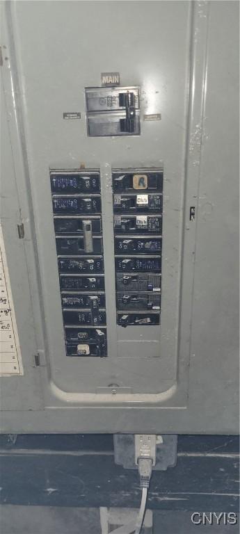 utility room featuring electric panel