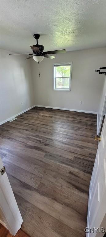 206 Oak St, Fulton, NY 13069 - empty room featuring a textured ceiling and wood finished floors