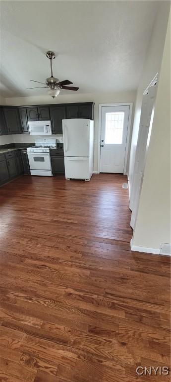 206 Oak St, Fulton, NY 13069 - kitchen with a ceiling fan, white appliances, dark wood-style floors, and baseboards