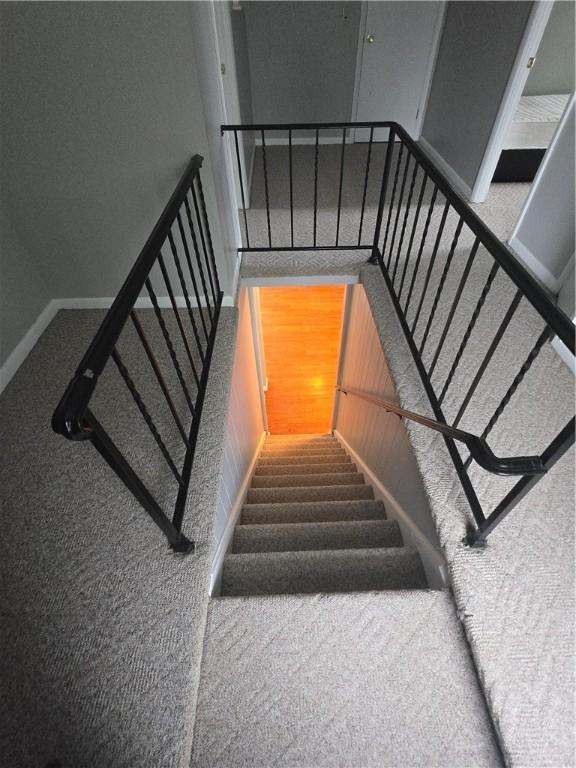 187 Cutler Ave, Corning-City, NY 14830 - staircase with carpet floors and baseboards