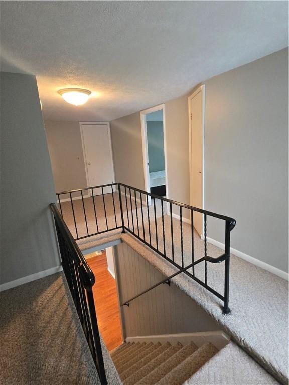 187 Cutler Ave, Corning-City, NY 14830 - staircase featuring baseboards and carpet