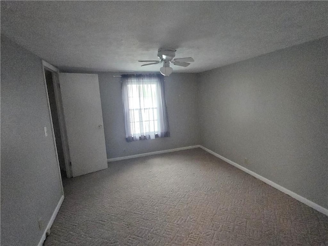 187 Cutler Ave, Corning-City, NY 14830 - carpeted empty room featuring a textured ceiling, ceiling fan, and baseboards