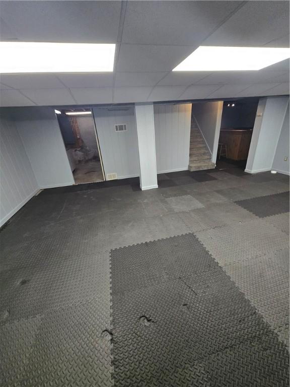 187 Cutler Ave, Corning-City, NY 14830 - finished basement featuring stairway, baseboards, a drop ceiling, and visible vents