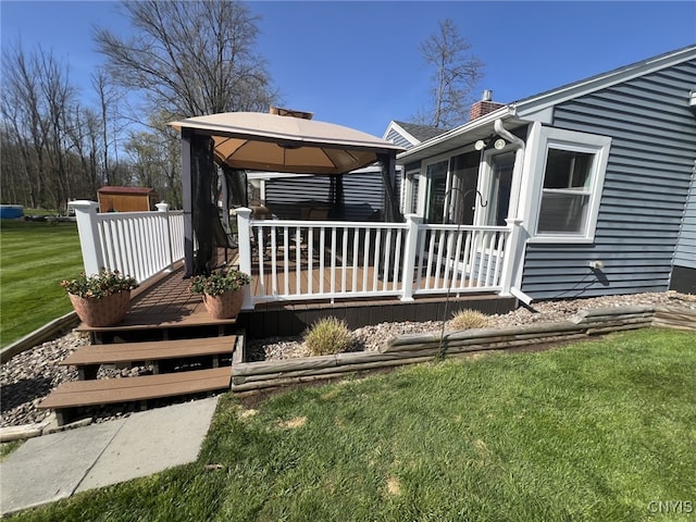exterior space with a lawn and a gazebo