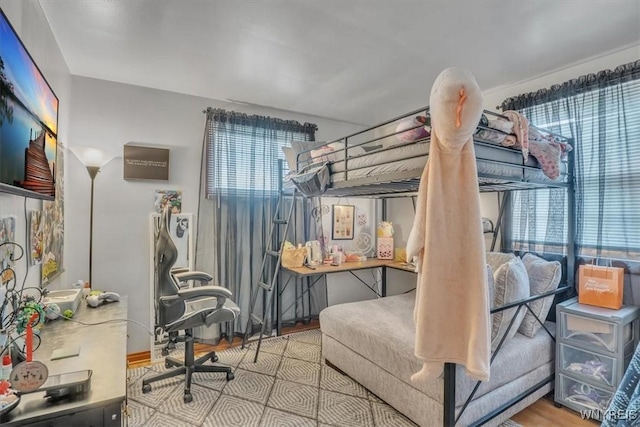 bedroom featuring wood finished floors