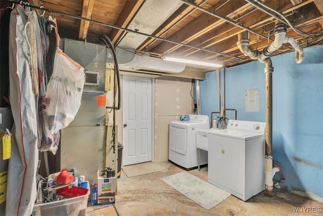 laundry room featuring separate washer and dryer, laundry area, and visible vents
