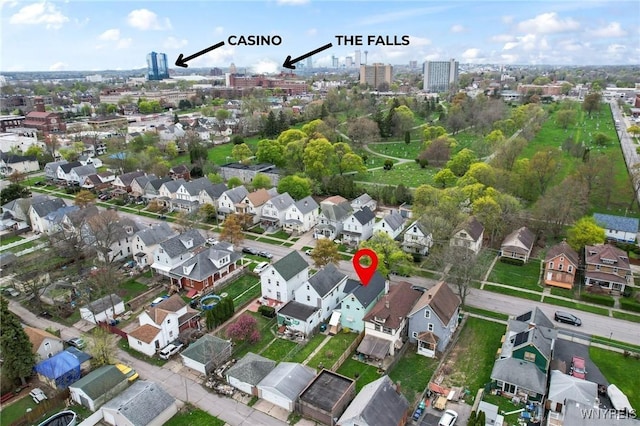 aerial view featuring a view of city and a residential view