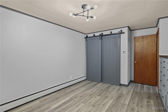 unfurnished bedroom featuring a barn door, a baseboard heating unit, light wood finished floors, a chandelier, and ornamental molding