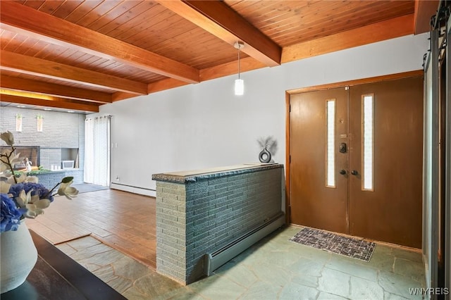 entrance foyer featuring beam ceiling, a baseboard heating unit, and wood ceiling
