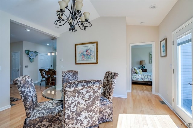 222 William St, Brownville, NY 13634 - dining space with an inviting chandelier, light wood finished floors, and a wealth of natural light