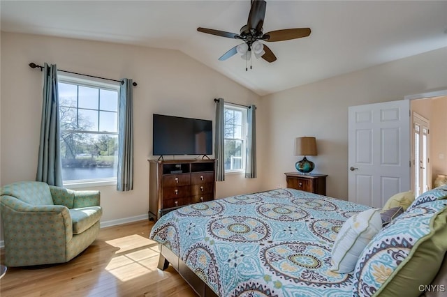 222 William St, Brownville, NY 13634 - bedroom featuring a ceiling fan, baseboards, light wood-style flooring, and lofted ceiling