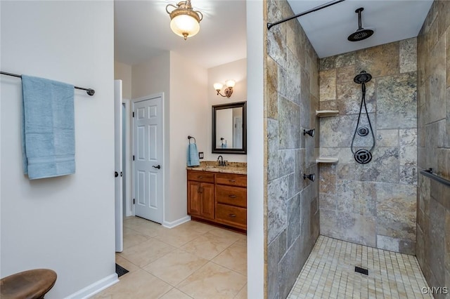 222 William St, Brownville, NY 13634 - bathroom featuring vanity, tile patterned flooring, baseboards, and tiled shower