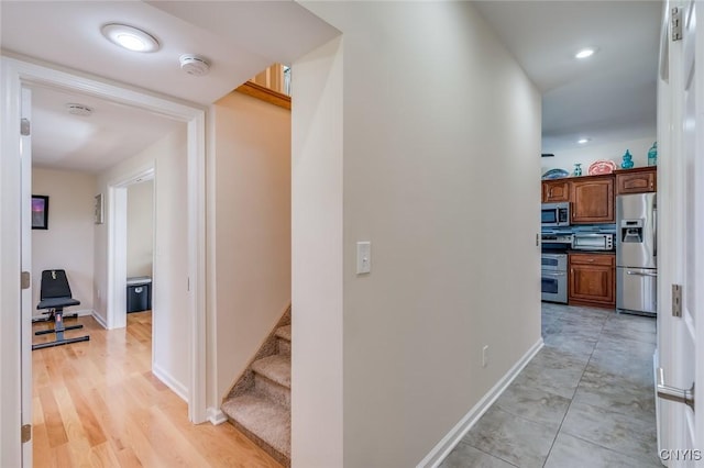 222 William St, Brownville, NY 13634 - hall with recessed lighting, baseboards, and stairway