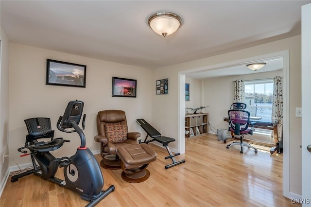 222 William St, Brownville, NY 13634 - workout area featuring baseboards and wood finished floors