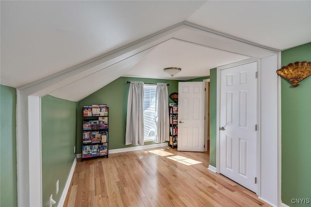 222 William St, Brownville, NY 13634 - bonus room featuring baseboards, light wood finished floors, and lofted ceiling
