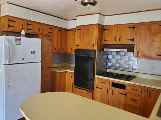 212 Mechanic St, Elmira City, NY 14904 - kitchen with black appliances, a warming drawer, brown cabinetry, decorative backsplash, and light countertops