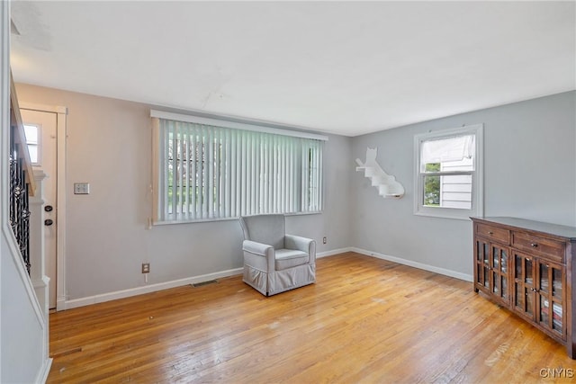 504 Beverly Dr, Camillus, NY 13219 - unfurnished room featuring baseboards, visible vents, and hardwood / wood-style floors