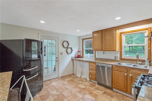 504 Beverly Dr, Camillus, NY 13219 - kitchen with a sink, light countertops, stainless steel appliances, and recessed lighting