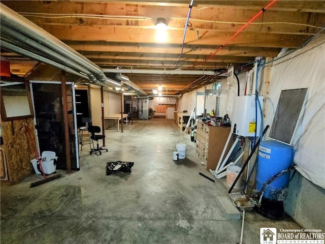 804 Smith Rd, Villenova, NY 14062 - unfinished below grade area with a water pressure tank