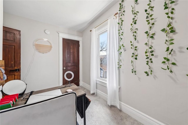 office space with light colored carpet and baseboards