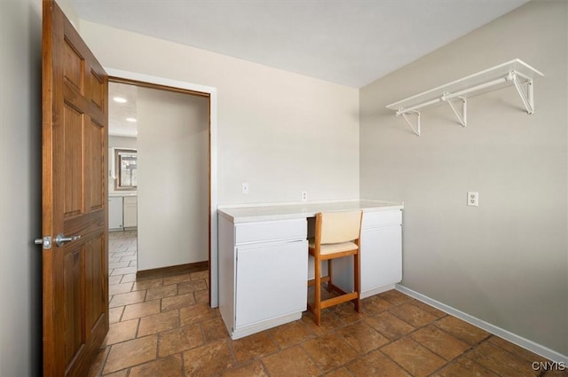 3578 S St, Kirkland, NY 13323 - laundry area with baseboards and stone tile floors