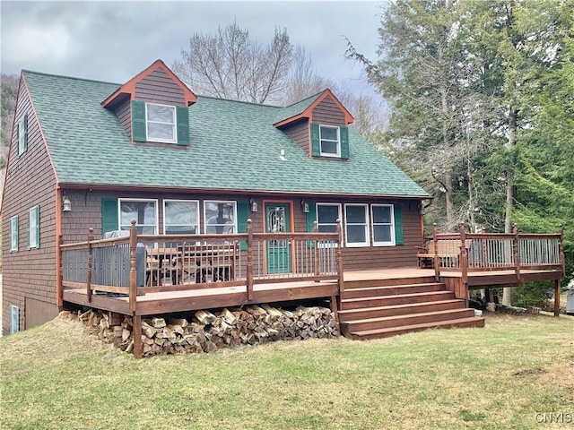 5048 State Route 28, Webb, NY 13420 - rear view of property featuring a yard, a wooden deck, and a shingled roof
