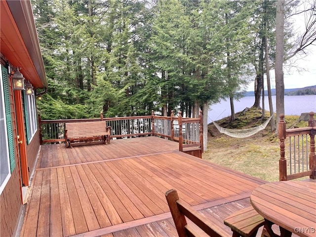 5048 State Route 28, Webb, NY 13420 - wooden terrace featuring a water view