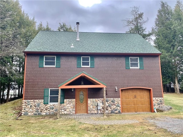 5048 State Route 28, Webb, NY 13420 - view of front of home featuring stone siding, roof with shingles, a garage, and driveway
