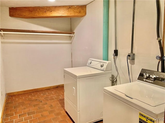 5048 State Route 28, Webb, NY 13420 - laundry room with separate washer and dryer, laundry area, and baseboards