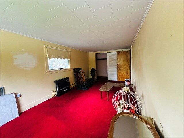 121 E William St, Bath, NY 14810 - sitting room featuring baseboards, carpet flooring, and crown molding