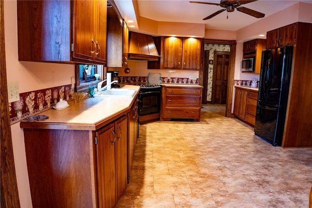 kitchen featuring freestanding refrigerator, electric range, stainless steel microwave, ceiling fan, and custom range hood