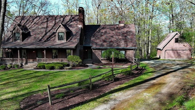 10400 Fox Ridge Rd, Corning, NY 14830 - view of front of house with a chimney, an outdoor structure, covered porch, a front lawn, and a detached garage