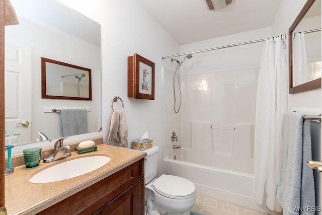 bathroom featuring toilet, visible vents, vanity, and shower / bathtub combination with curtain
