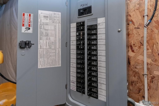 utility room featuring electric panel