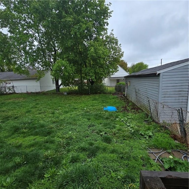 view of yard featuring fence