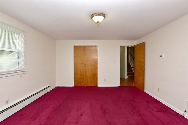 726 Robinson Hill Rd, Union, NY 13790 - unfurnished bedroom with carpet flooring, baseboards, and a baseboard heating unit