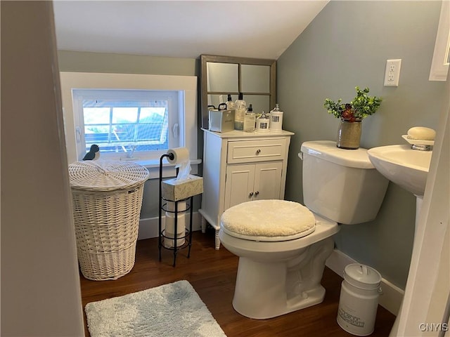 bathroom featuring toilet and wood finished floors