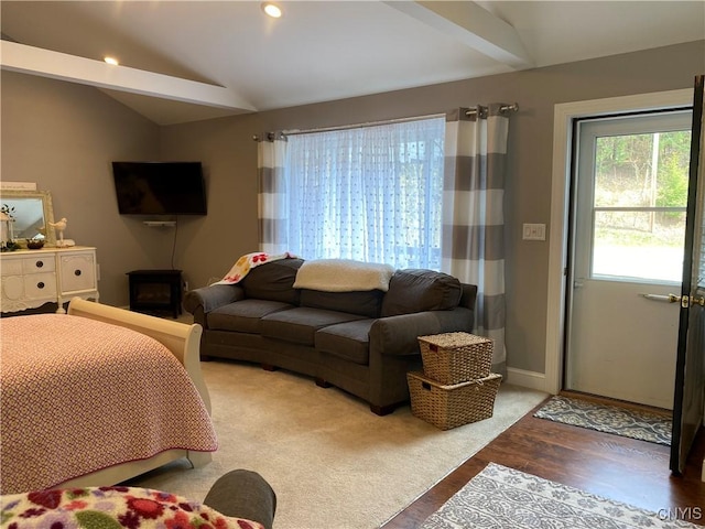 bedroom featuring baseboards, wood finished floors, lofted ceiling, and recessed lighting