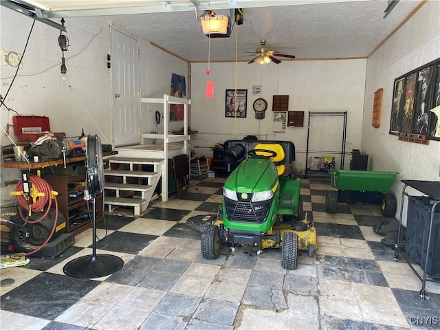 garage with a ceiling fan and a garage door opener