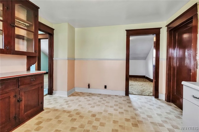 interior space with baseboards