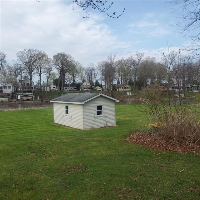 view of outbuilding featuring an outdoor structure and a residential view
