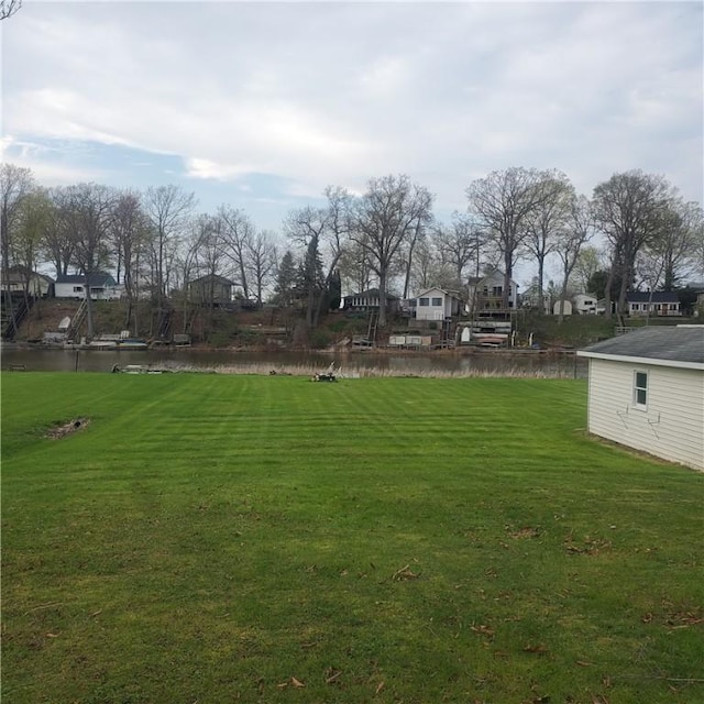 view of yard with a residential view