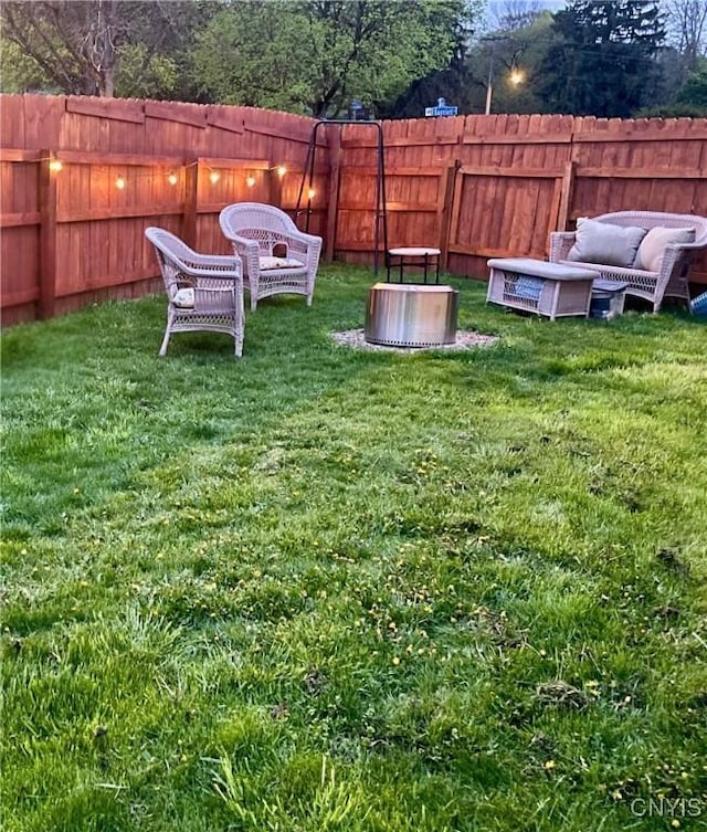 view of yard featuring a fenced backyard