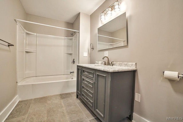 bathroom featuring baseboards,  shower combination, and vanity