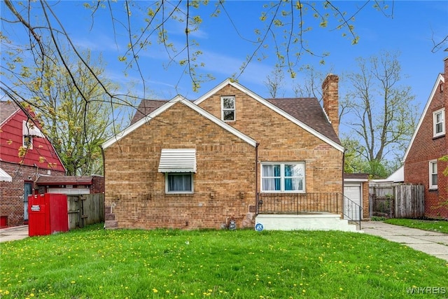 321 Eggert Rd, Cheektowaga, NY 14215 - back of property featuring brick siding, a chimney, and a garage