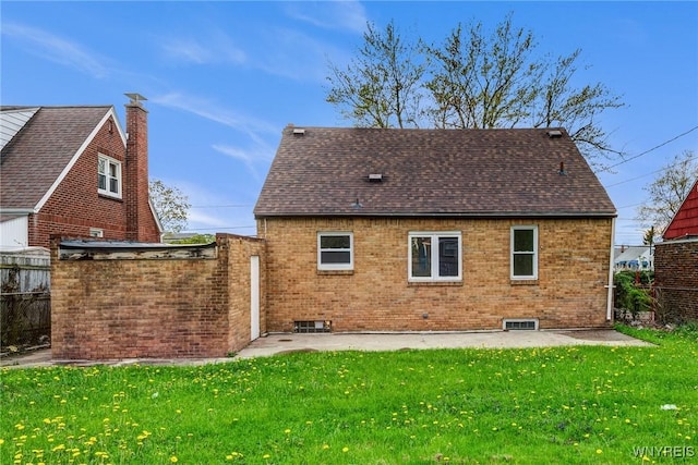 321 Eggert Rd, Cheektowaga, NY 14215 - back of house with brick siding, roof with shingles, and a patio