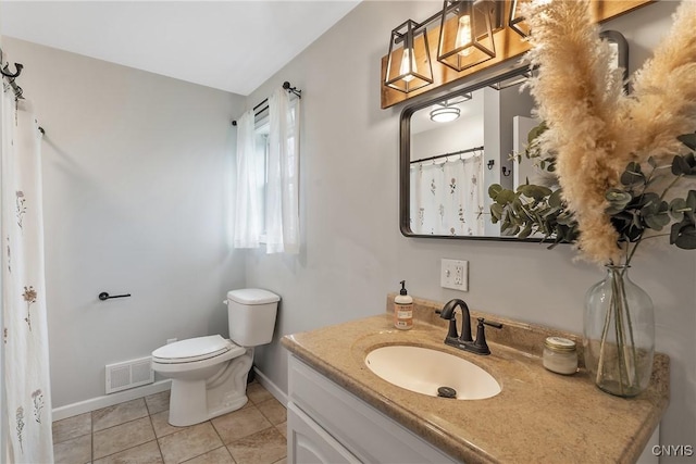 26519 State Route 180, Brownville, NY 13634 - bathroom featuring toilet, vanity, visible vents, tile patterned floors, and baseboards
