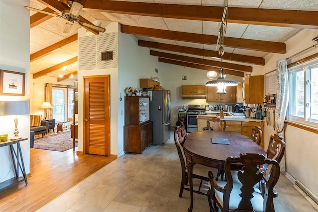 dining room featuring lofted ceiling with beams, a ceiling fan, baseboards, and visible vents