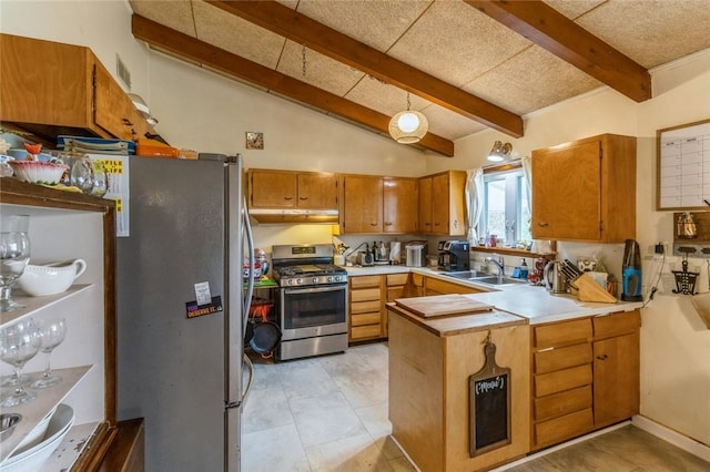 kitchen with under cabinet range hood, a sink, a peninsula, brown cabinets, and stainless steel appliances
